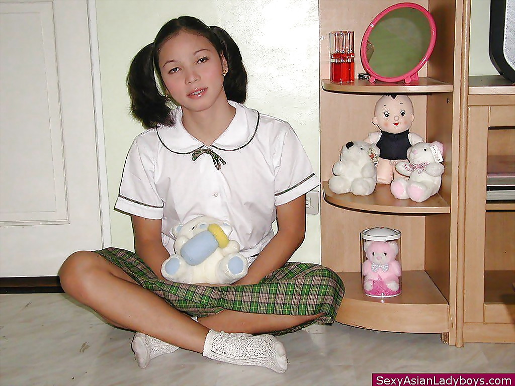 Pretty ladyboy in pigtails lifs skirt for nice up skirt of sexy panties
