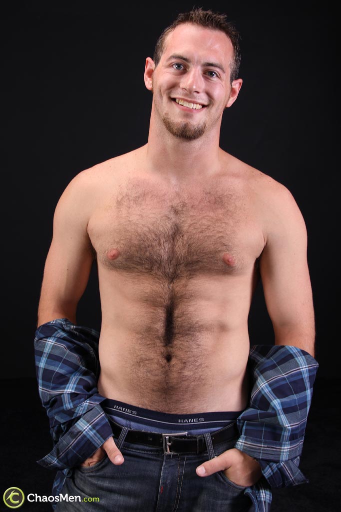 Hot gay fellow Stone exposes his hairy chest and big stiff dick in a solo  