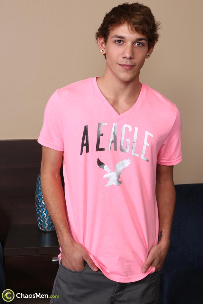 Cute teen gay Malik doffs his pink shirt and pulls out his massive dick