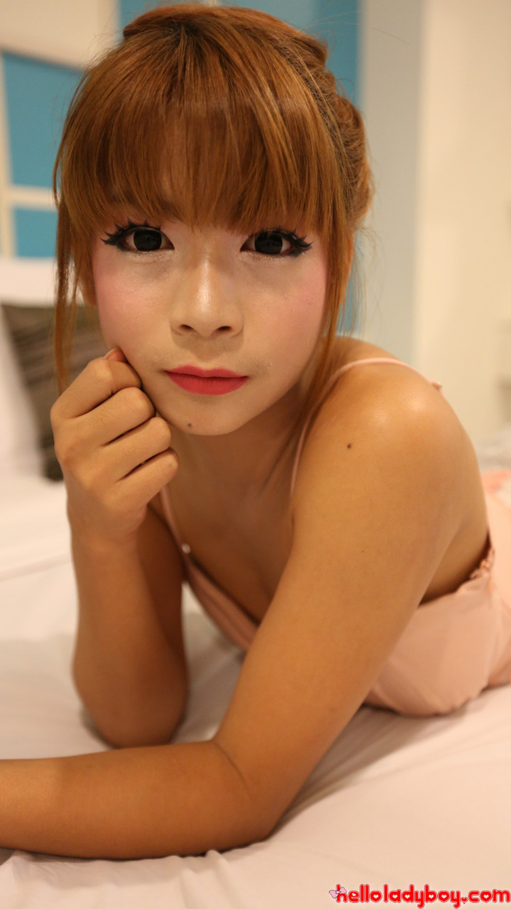 Pretty Asian shemale shows her petite body  