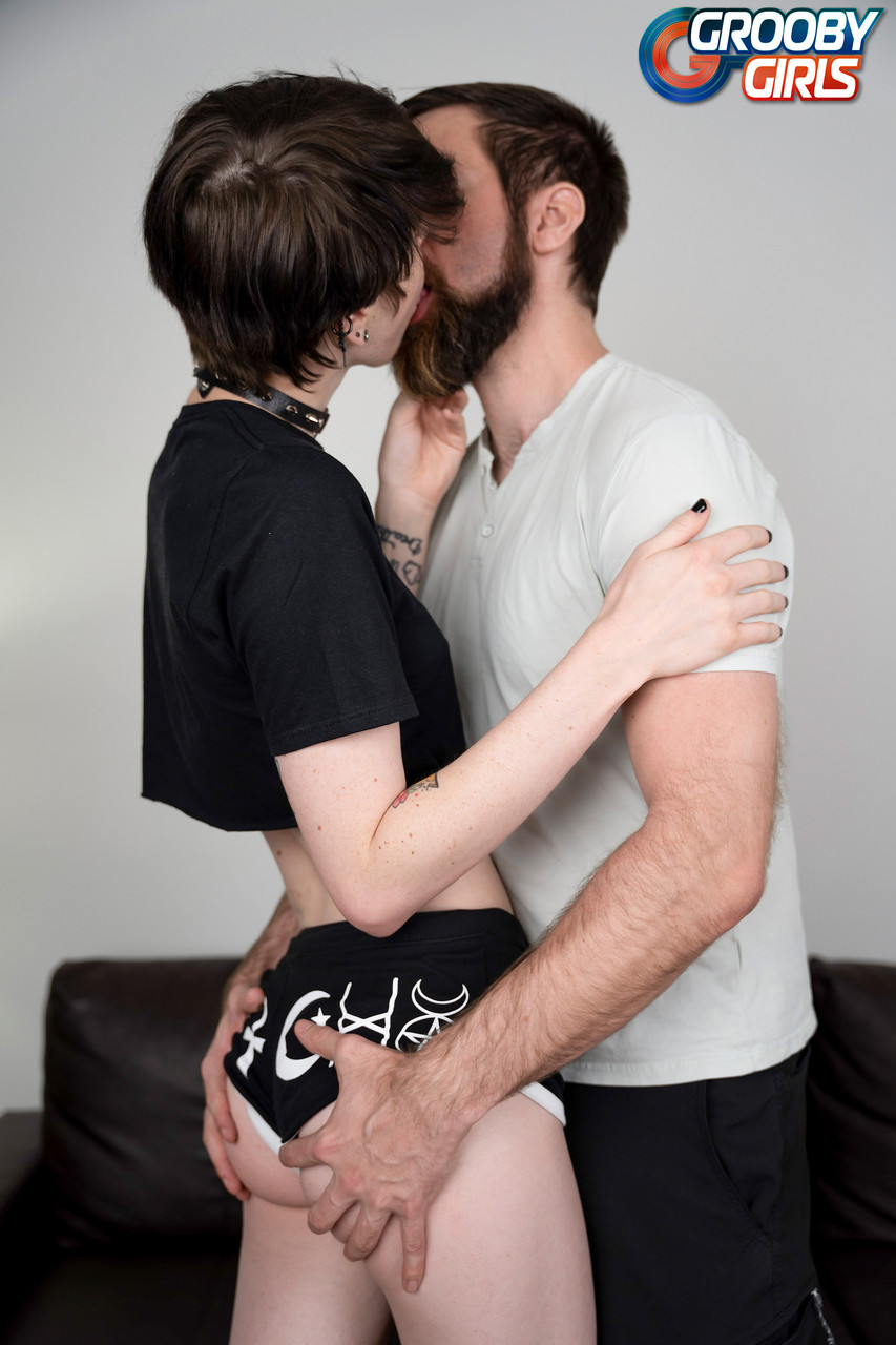 Skinny emo shemale kisses a bearded gay and takes his dick from behind  