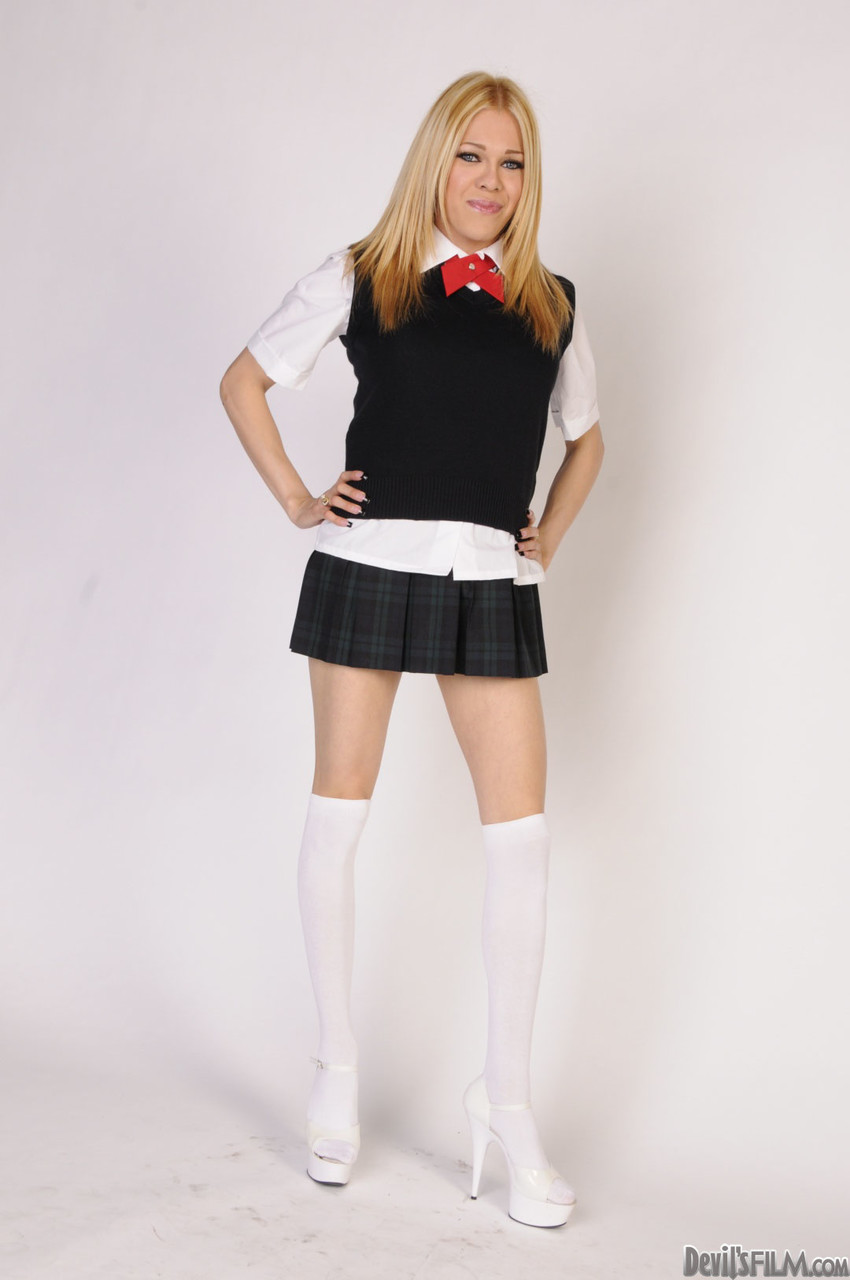 Blonde shemale in college uniform spreads legs for principal in his office
